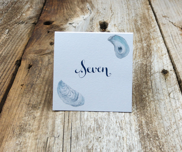 Oyster Shell Pocket Table Signs