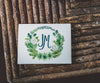 winter greens wedding crest