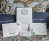 winter greens wedding crest