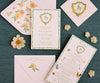 floral crest with vine border invitation