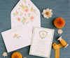 orange and yellow wedding floral crest