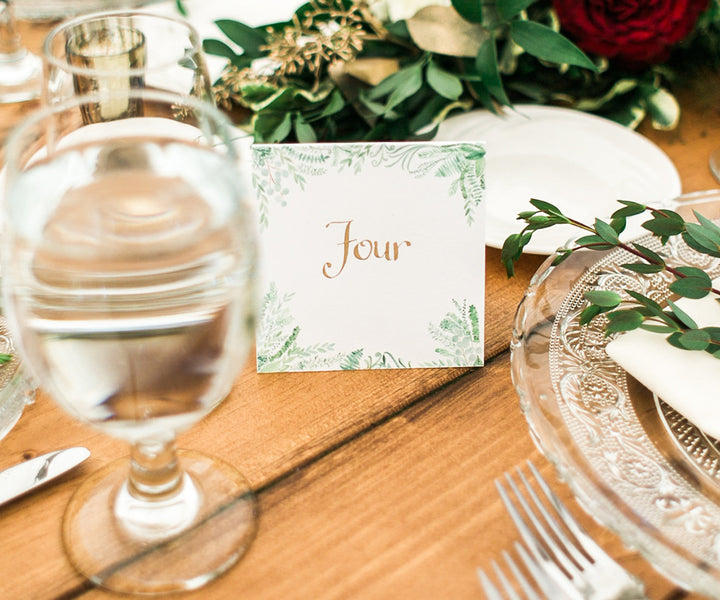 Flourishing greens table number Rachel Halsey Photography