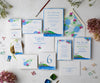 Beach rose hydrangea lighthouse wedding invitations