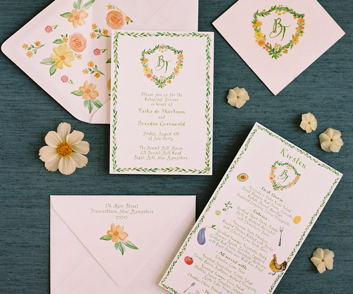 floral crest with vine border invitation
